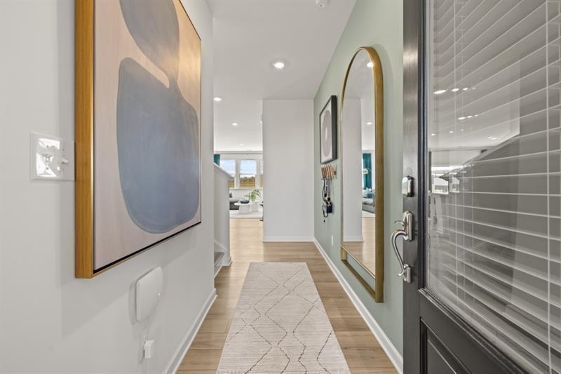 2752 Lou Lou Lane Buford, GA 30519 - Photo 2 of 25 a view of a hallway with wooden floor