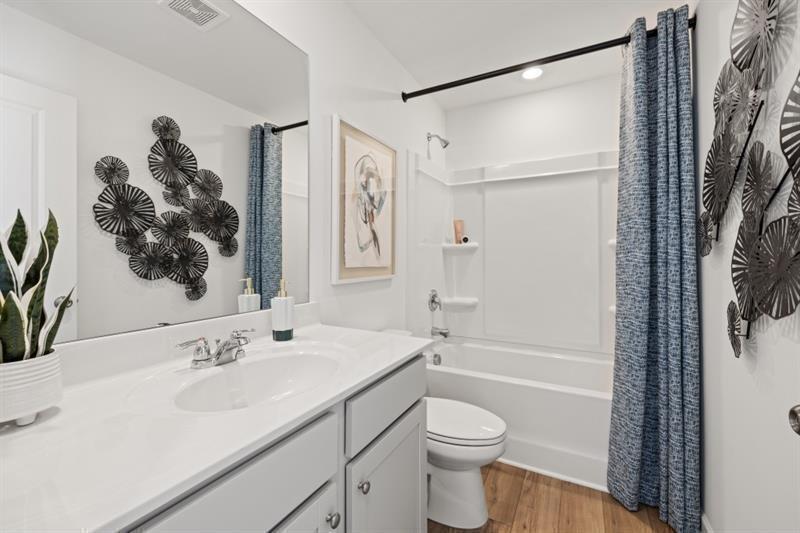 2752 Lou Lou Lane Buford, GA 30519 - Photo 21 of 25 a bathroom with a sink toilet and shower