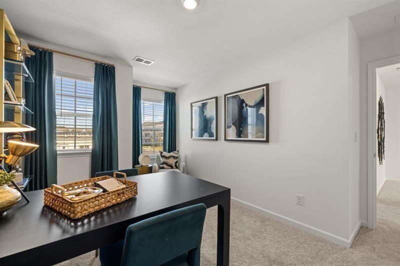 2752 Lou Lou Lane Buford, GA 30519 - Photo 23 of 25 a living room with furniture and a window