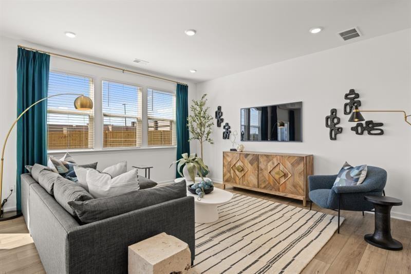 2752 Lou Lou Lane Buford, GA 30519 - Photo 3 of 25 a living room with furniture and window