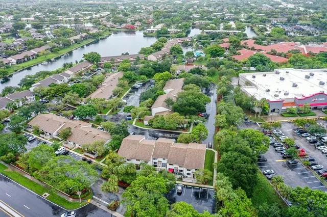 an aerial view of house with yard