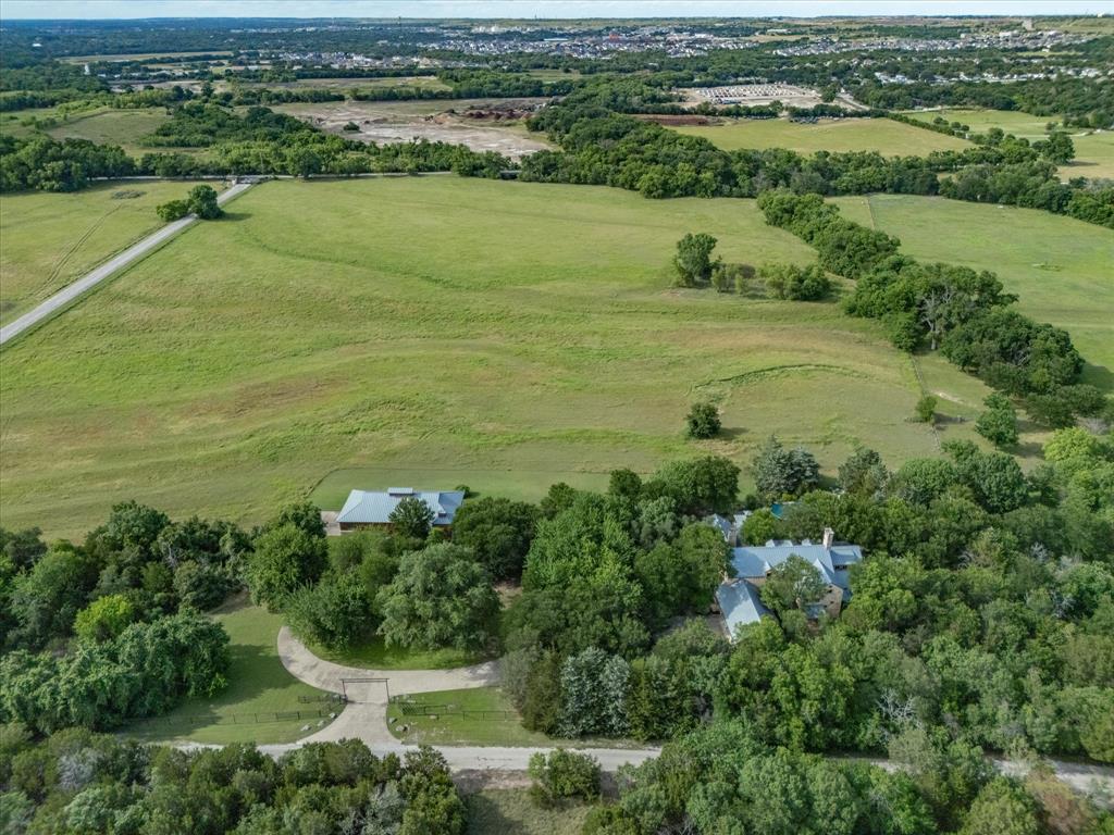 151 Trinity Bluffs Road Aledo, TX 76008 - Photo 40 of 40 an aerial view of a houses with ocean view