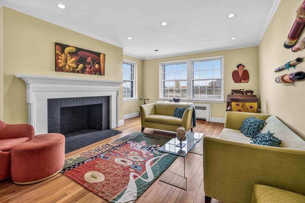 280 Beacon Street, Unit 54 Boston, MA 02116 - Photo 3 of 17 a living room with furniture and a fireplace