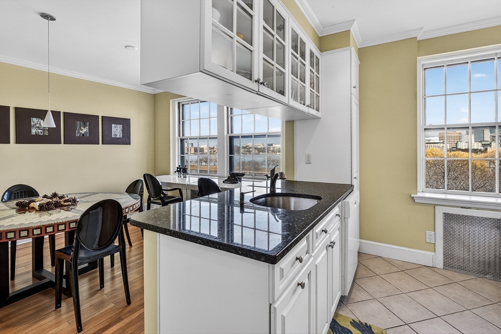 280 Beacon Street, Unit 54 Boston, MA 02116 - Photo 6 of 17 a kitchen that has a sink and a stove in it