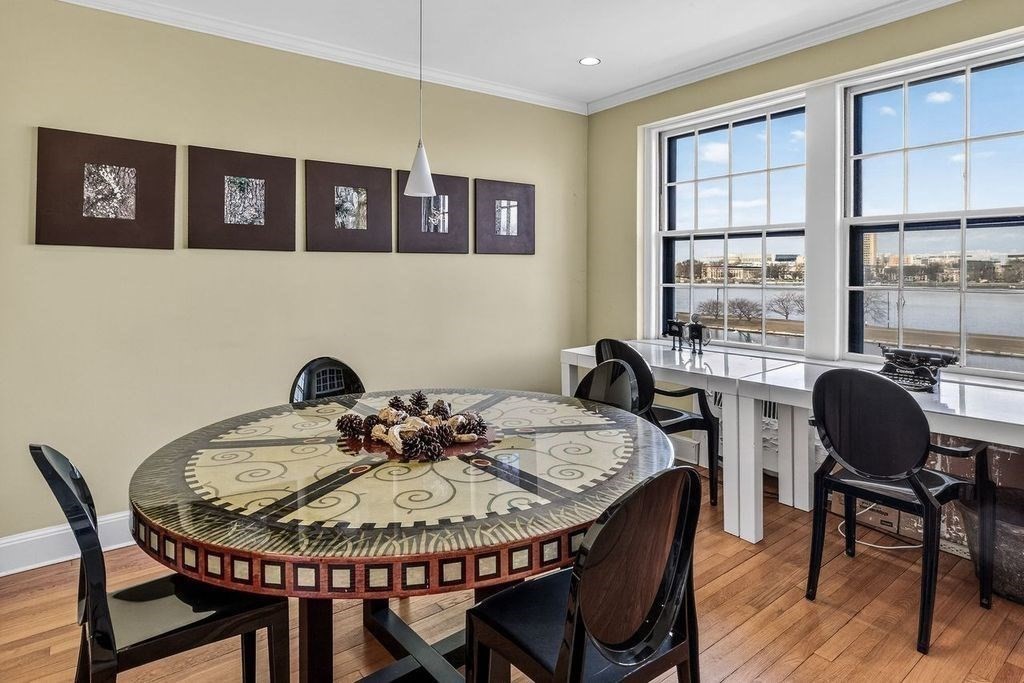280 Beacon Street, Unit 54 Boston, MA 02116 - Photo 7 of 17 a view of a dining room with furniture and wooden floor