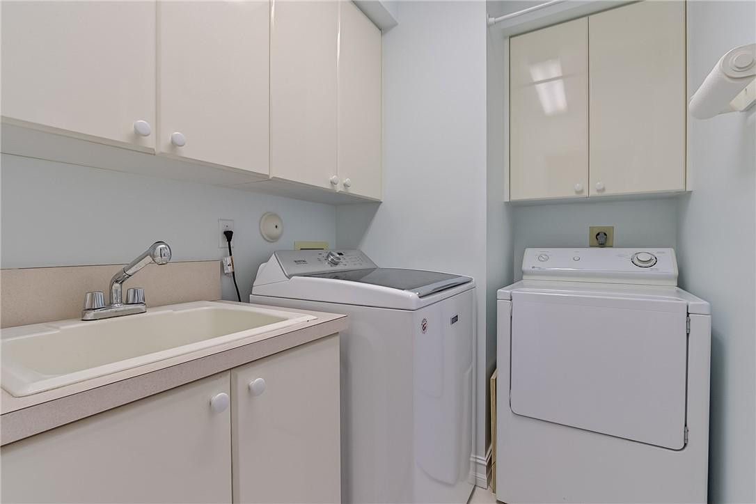 6173 Northwest 23rd Road Boca Raton, FL 33434 - Photo 32 of 60 Laundry room with tons of storage space