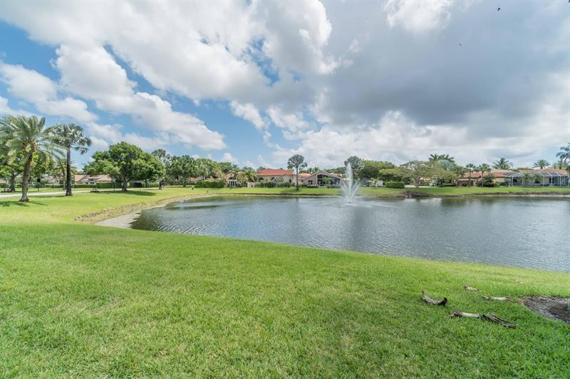 6173 Northwest 23rd Road Boca Raton, FL 33434 - Photo 55 of 60 Large lake with fountain in community