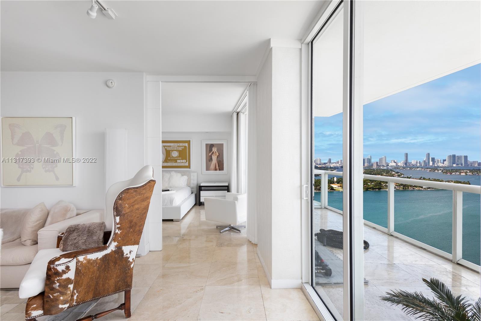 450 Alton Road, Unit 2706 Miami Beach, FL 33139 - Photo 3 of 53 a living room with furniture