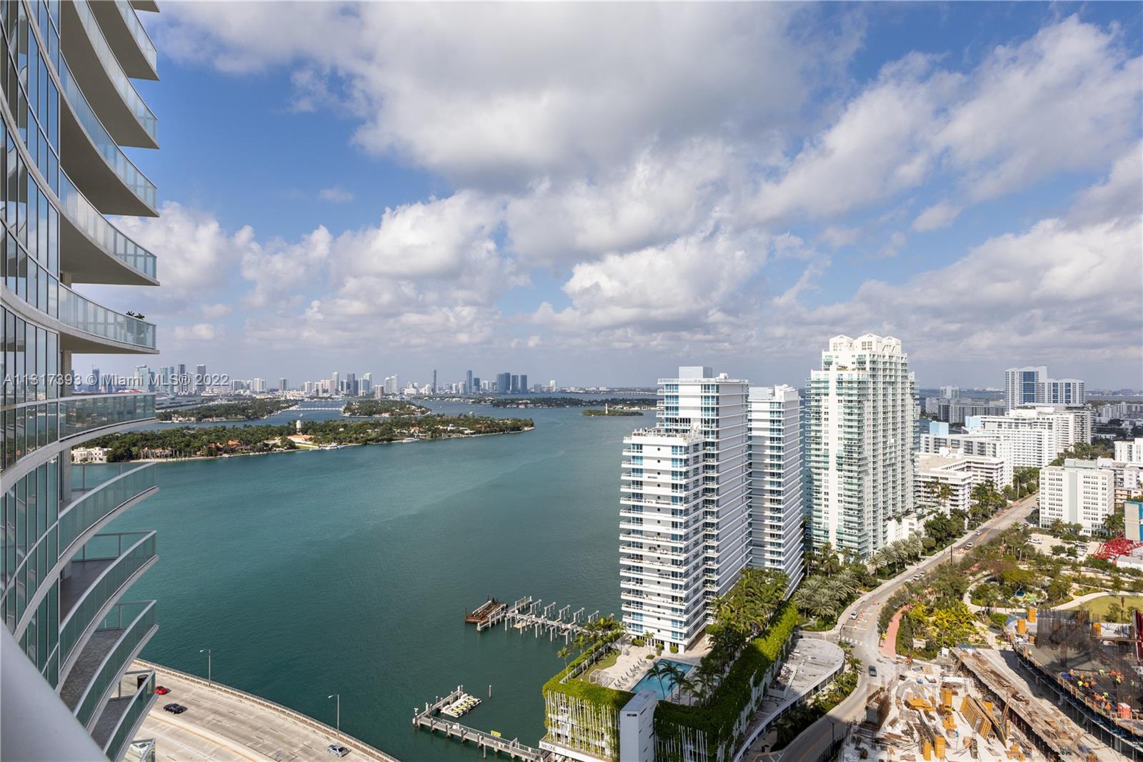 450 Alton Road, Unit 2706 Miami Beach, FL 33139 - Photo 4 of 53 a view of a city with lawn chairs