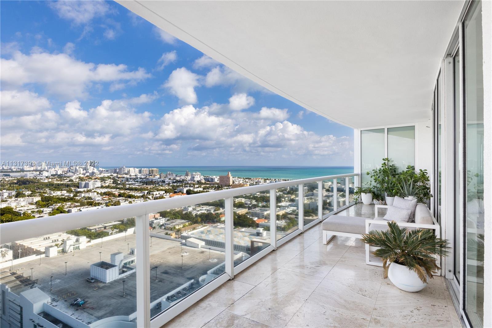 450 Alton Road, Unit 2706 Miami Beach, FL 33139 - Photo 6 of 53 a view of a balcony with lake view