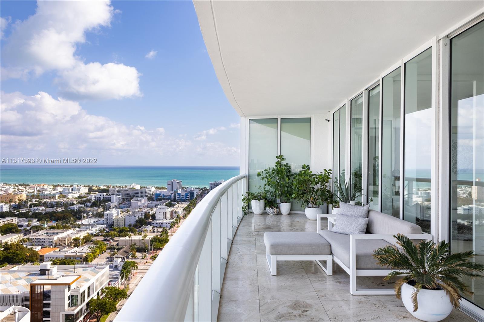 450 Alton Road, Unit 2706 Miami Beach, FL 33139 - Photo 8 of 53 a view of balcony and patio