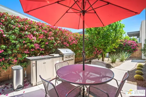 a table and chairs in the patio