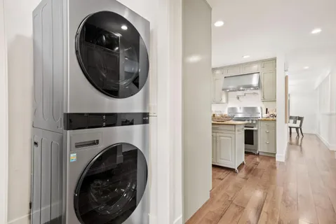 a view of a kitchen with washer and dryer