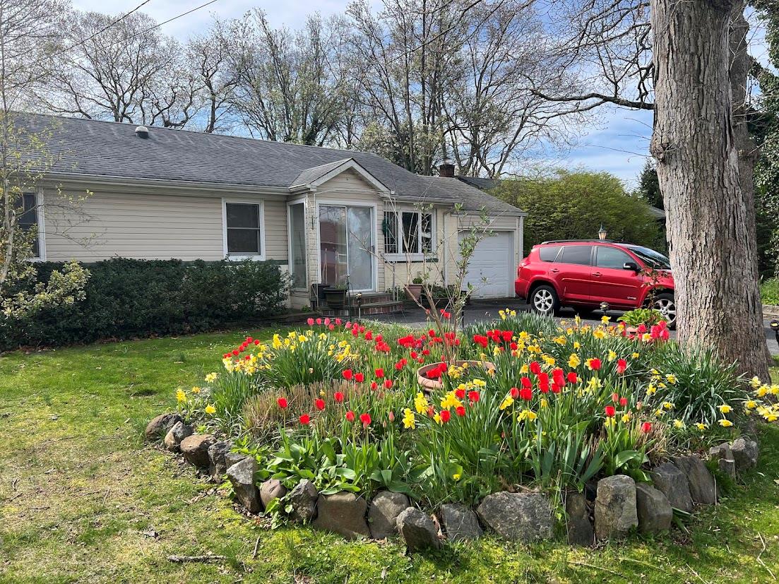 14 Robert Drive Huntington, NY 11743 - Photo 1 of 1 Ranch-style house featuring a garage and a front yard