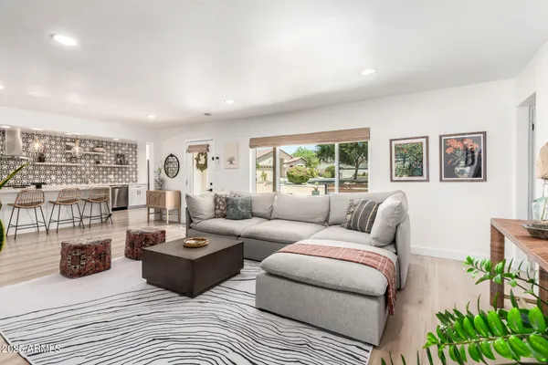 a kitchen with a sink and stove