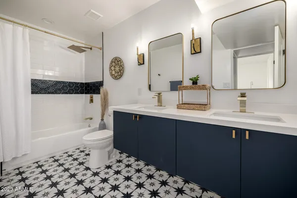 a patio with table and chairs