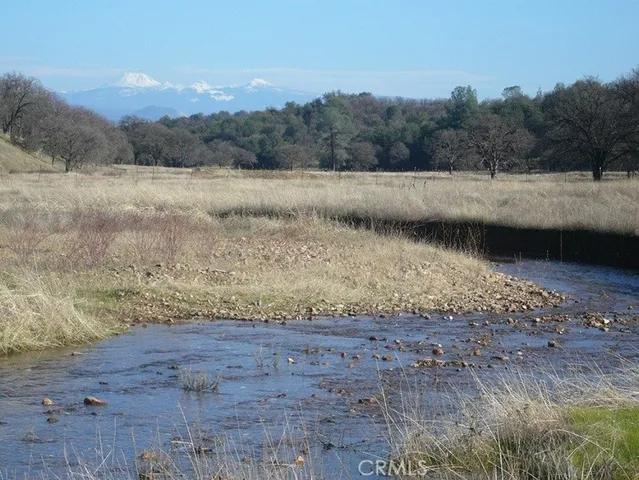 a view of lake with mountain