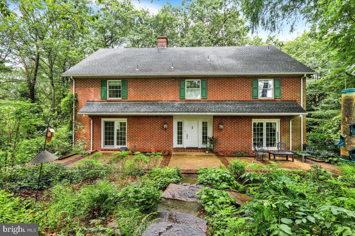 154 Deer Hill Road Reading, PA 19607 - Photo 1 of 97 a front view of a house with yard and green space