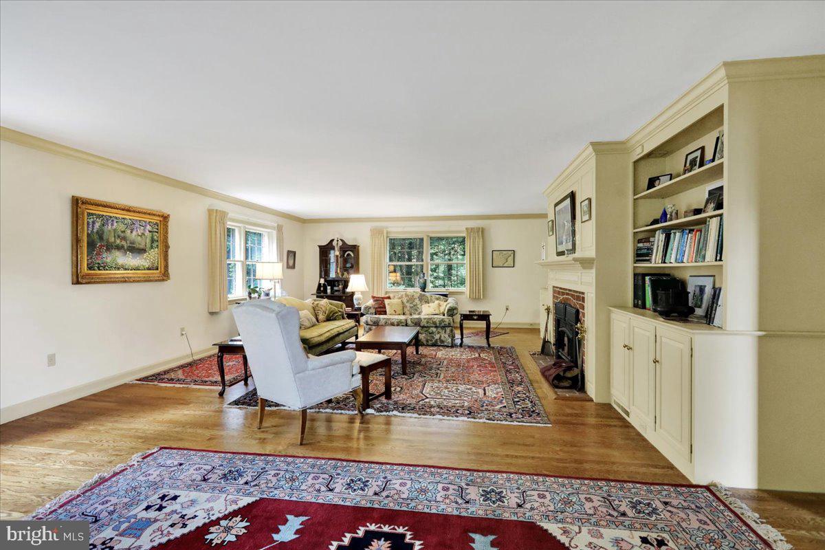 154 Deer Hill Road Reading, PA 19607 - Photo 11 of 97 a living room with fireplace furniture and a rug