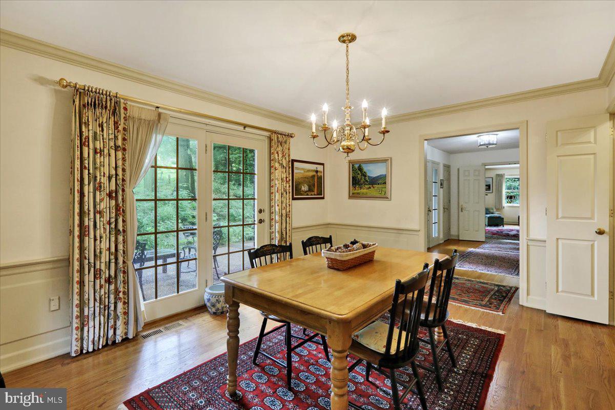 154 Deer Hill Road Reading, PA 19607 - Photo 19 of 97 a view of a dining room with furniture wooden floor and chandelier