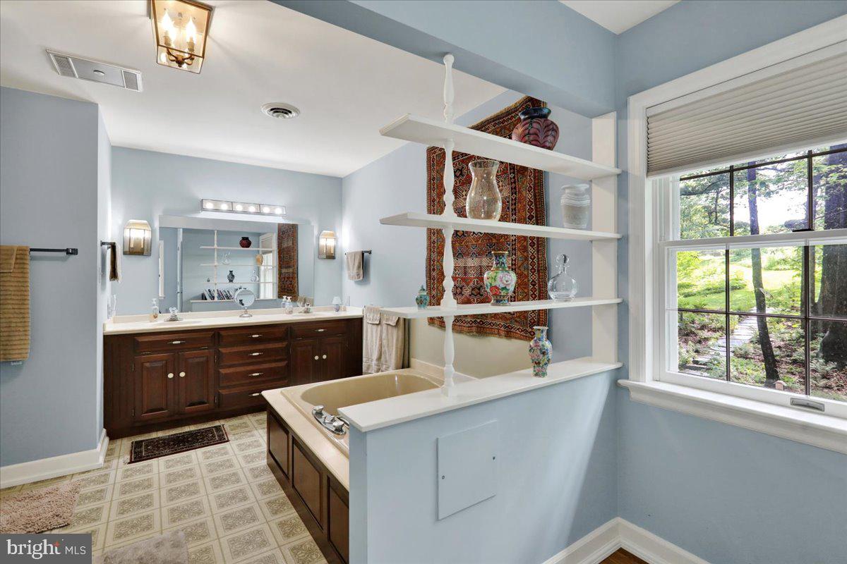 154 Deer Hill Road Reading, PA 19607 - Photo 30 of 97 a room with stainless steel appliances cabinets and a window