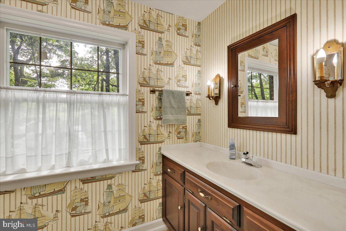 154 Deer Hill Road Reading, PA 19607 - Photo 32 of 97 a bathroom with a sink and a mirror