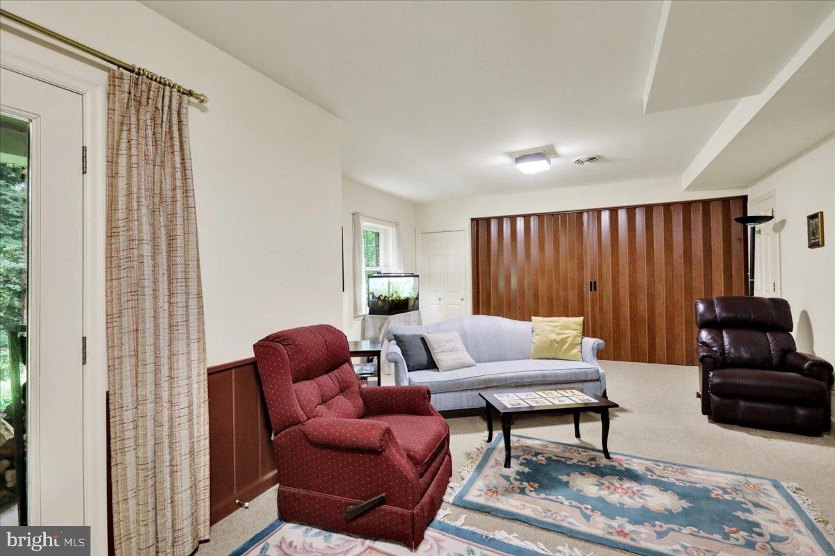 154 Deer Hill Road Reading, PA 19607 - Photo 51 of 97 a living room with furniture and a fireplace
