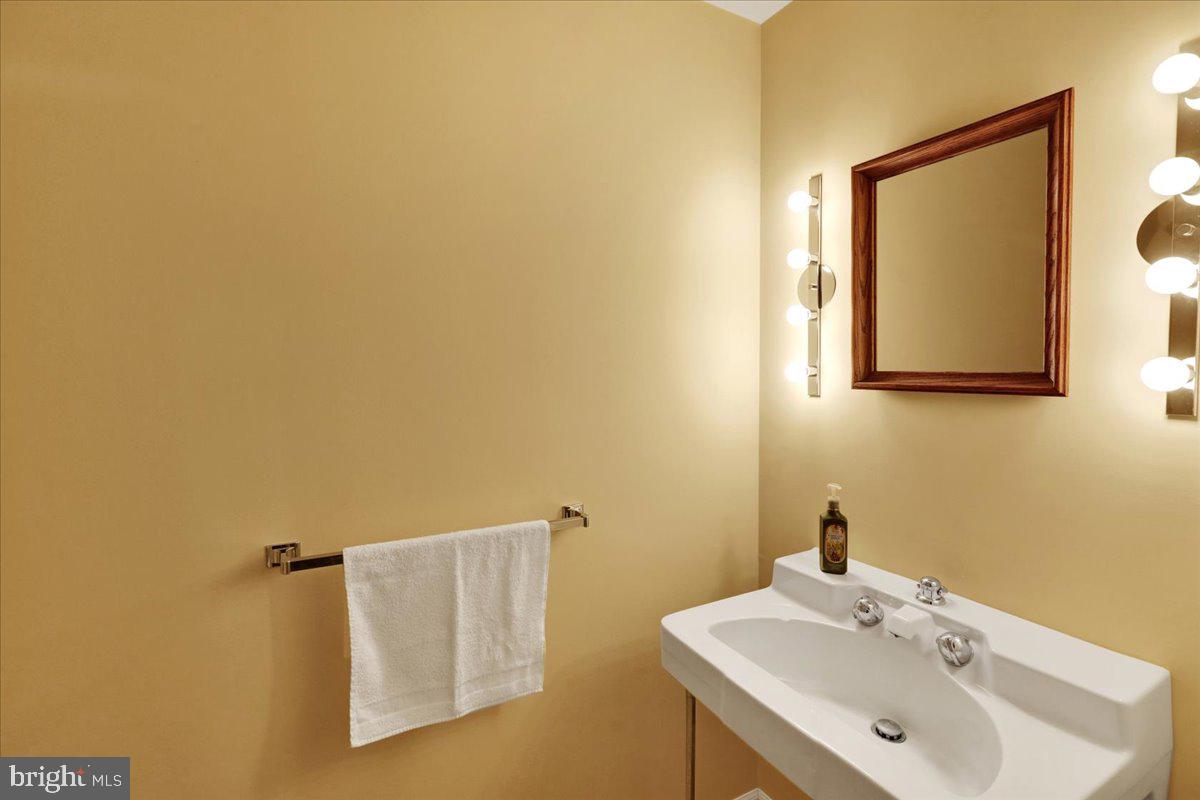 154 Deer Hill Road Reading, PA 19607 - Photo 52 of 97 a bathroom with a sink and mirror