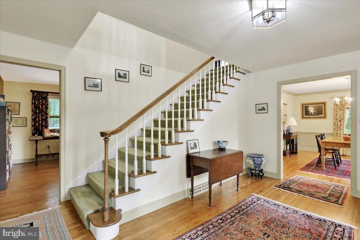 154 Deer Hill Road Reading, PA 19607 - Photo 6 of 97 a living room with furniture and a dining table with wooden floor