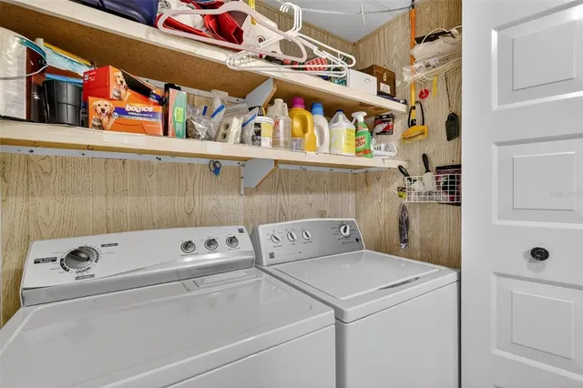 a utility room with dryer and washer