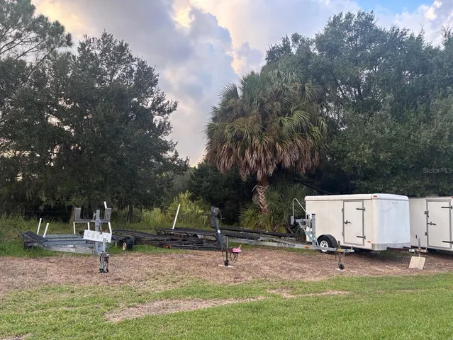 a view of a park with swings and slides