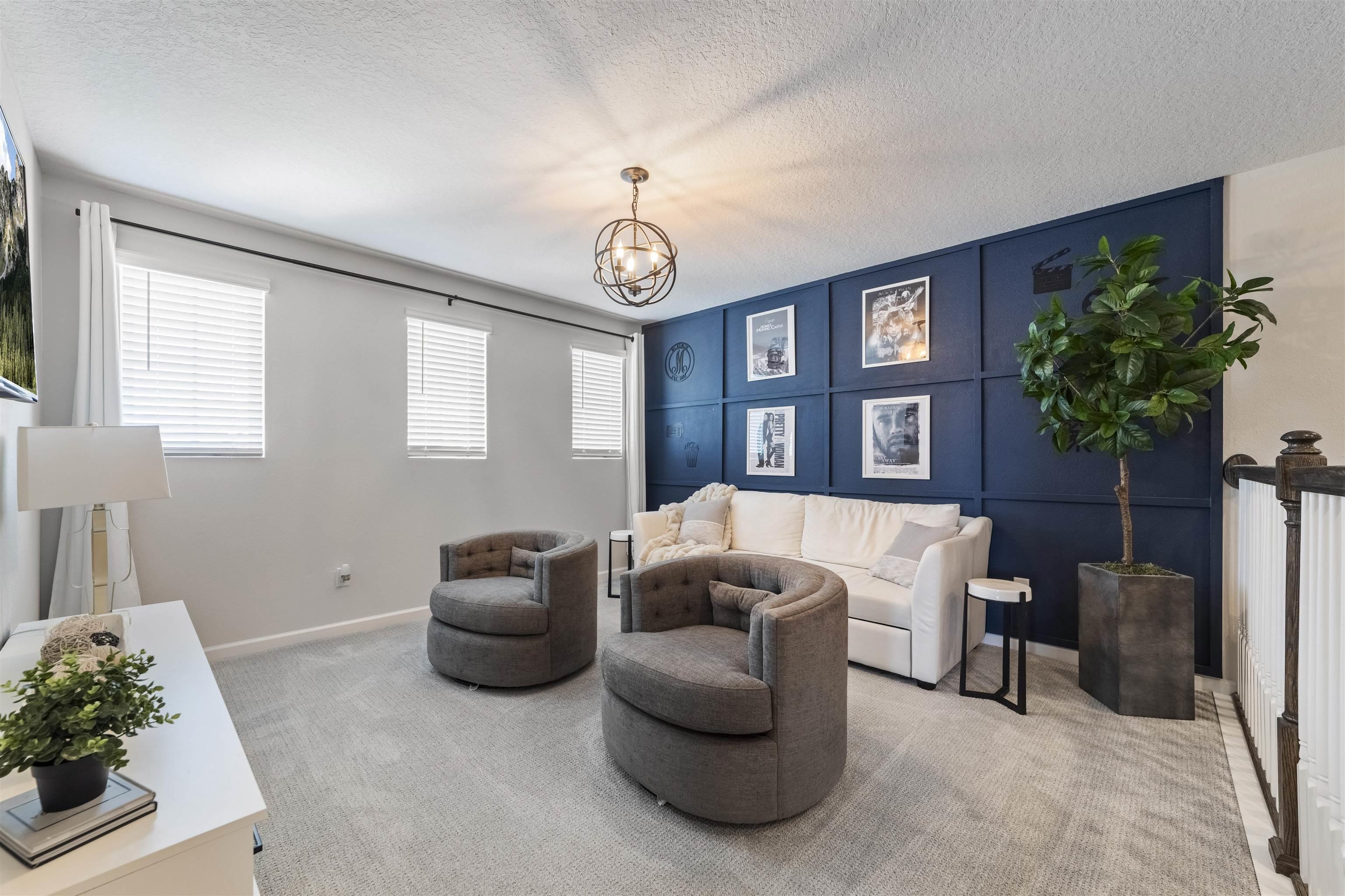 91 Pepperpike Way Street St. Augustine, FL 32092 - Photo 31 of 79 a living room with furniture a chandelier and a window