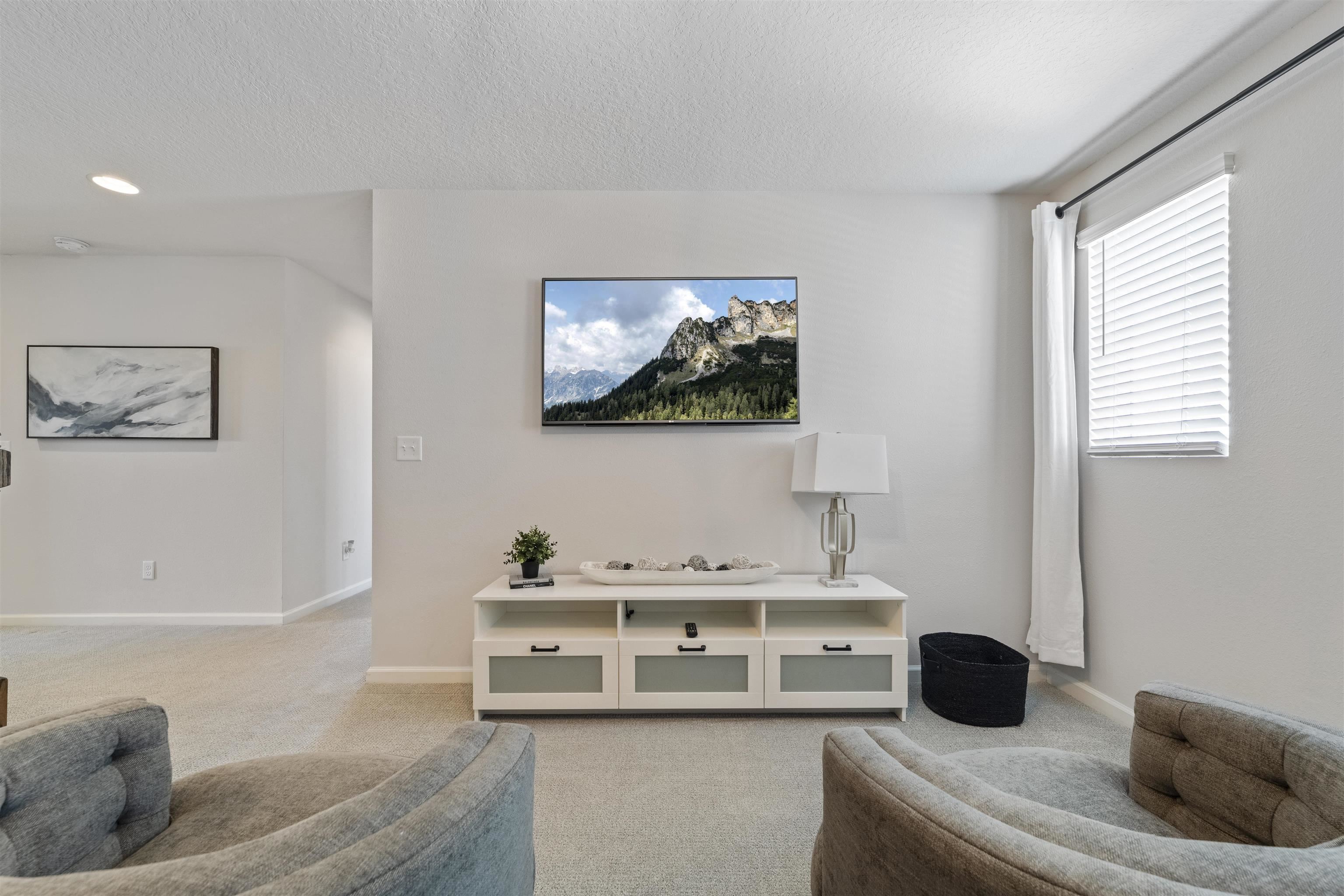 91 Pepperpike Way Street St. Augustine, FL 32092 - Photo 36 of 79 a living room with furniture and a flat screen tv