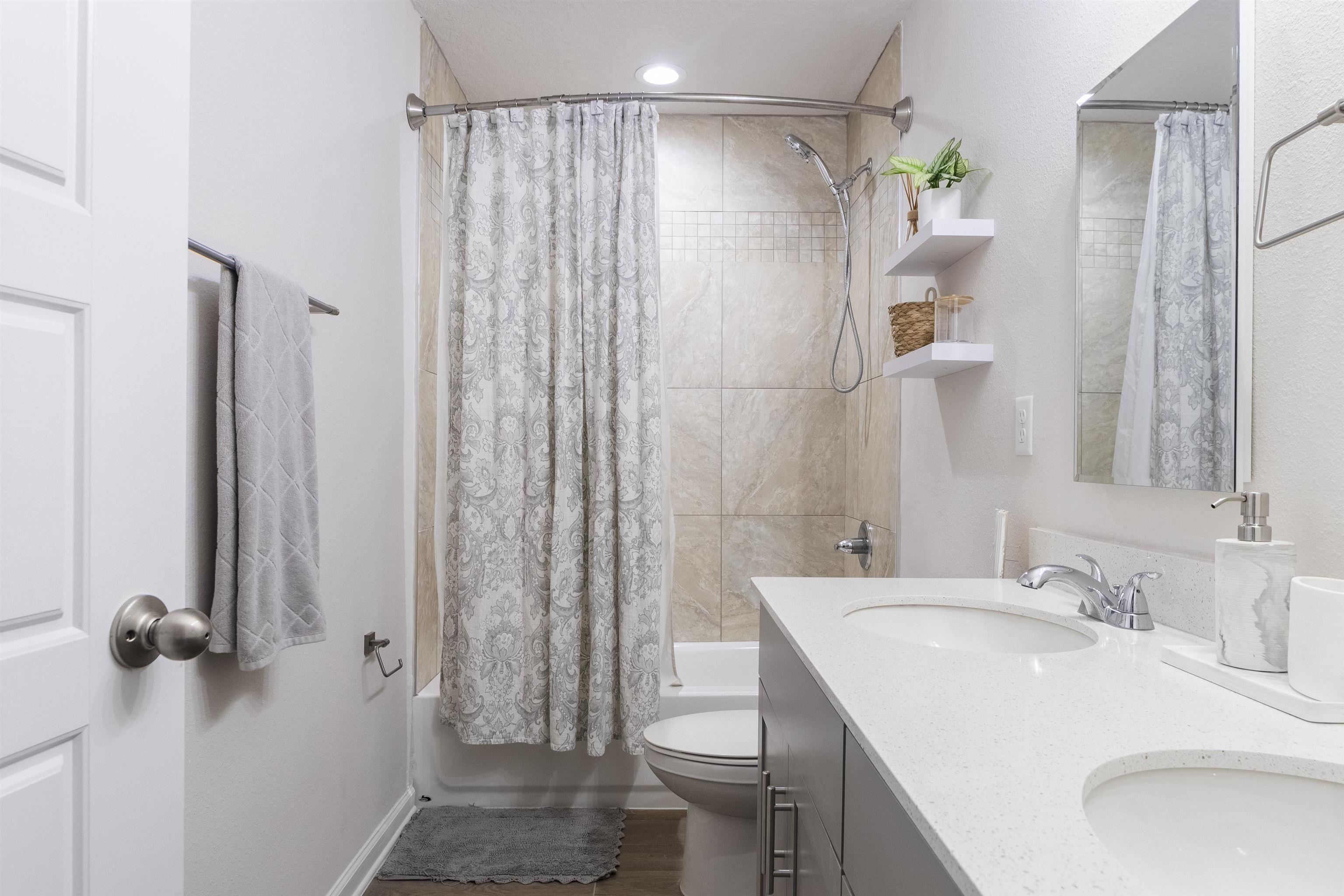 91 Pepperpike Way Street St. Augustine, FL 32092 - Photo 58 of 79 a bathroom with a sink toilet and shower