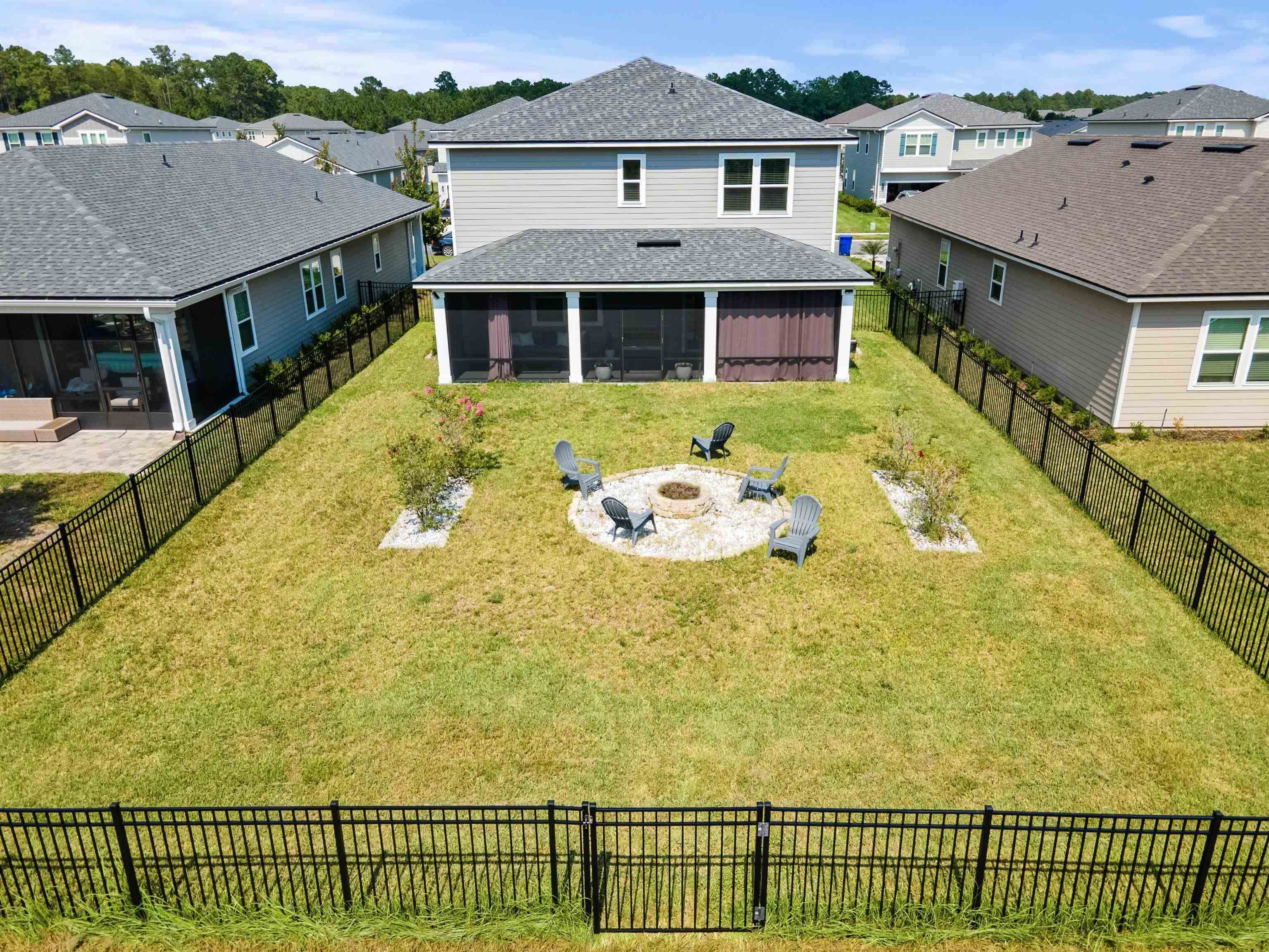 91 Pepperpike Way Street St. Augustine, FL 32092 - Photo 68 of 79 a front view of a house with a swimming pool