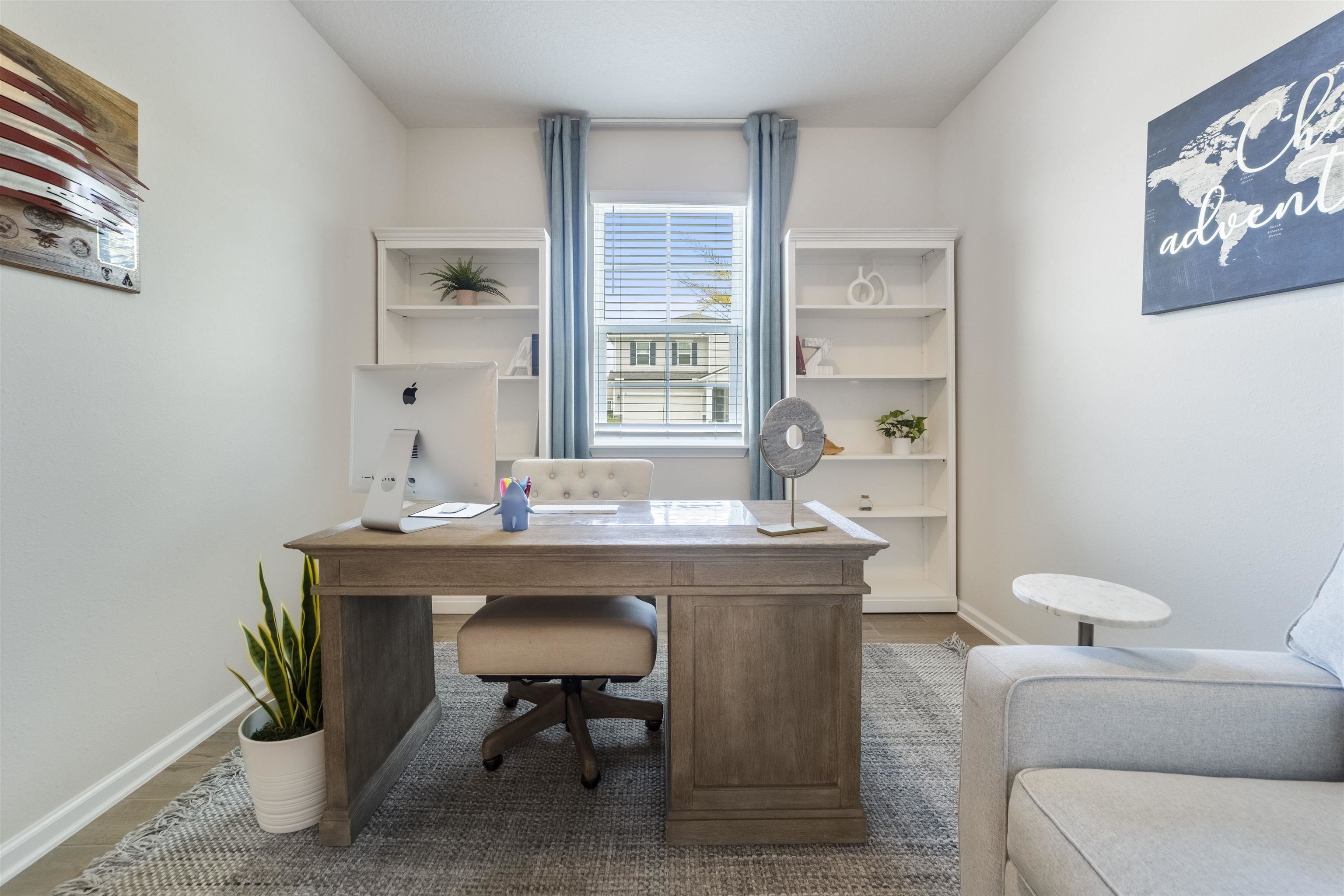 91 Pepperpike Way Street St. Augustine, FL 32092 - Photo 10 of 79 a room with a table chairs and wooden floor