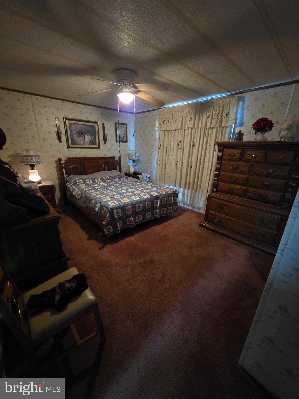 210 Maple Avenue Manheim, PA 17545 - Photo 5 of 10 a bed sitting in a bedroom next to a window