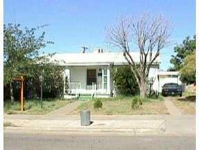 523 Mission Road El Paso, TX 79903 - Photo 1 of 1 a front view of a house with a yard table and chairs