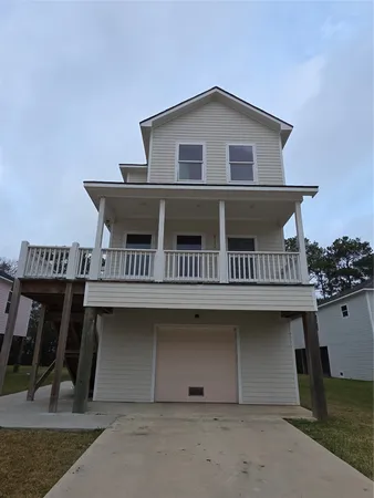 a view of a house with roof deck