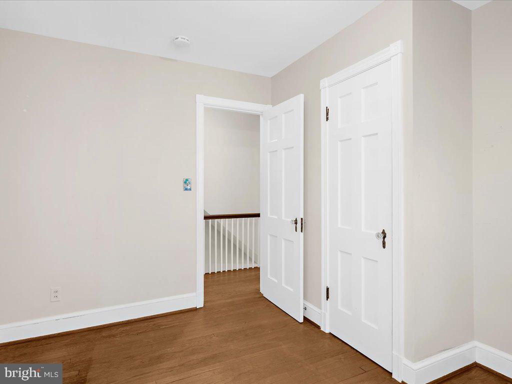 1201 Noyes Drive Silver Spring, MD 20910 - Photo 21 of 35 a view of a hallway with wooden floor