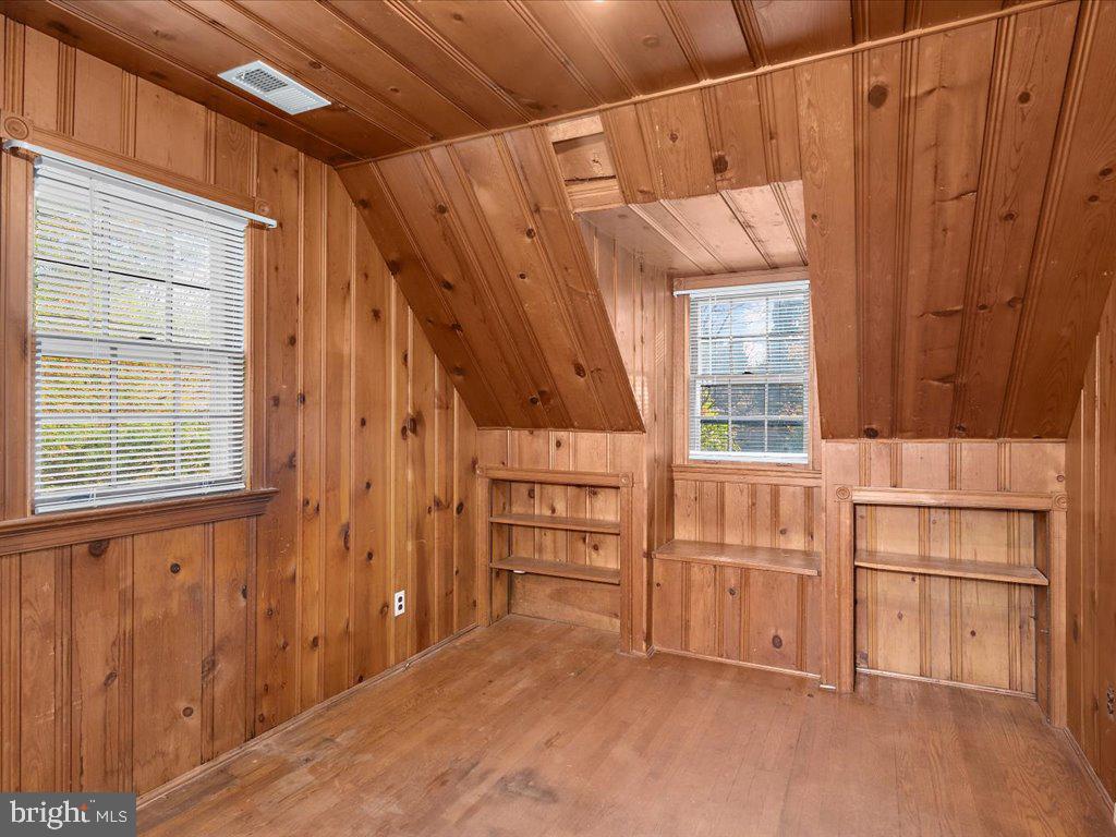 1201 Noyes Drive Silver Spring, MD 20910 - Photo 23 of 35 a view of a door and wooden walls