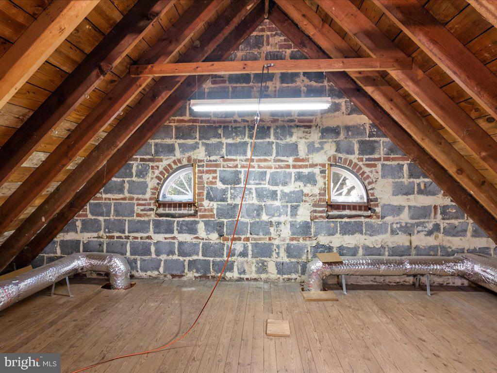 1201 Noyes Drive Silver Spring, MD 20910 - Photo 26 of 35 a view of an empty room with wooden floor