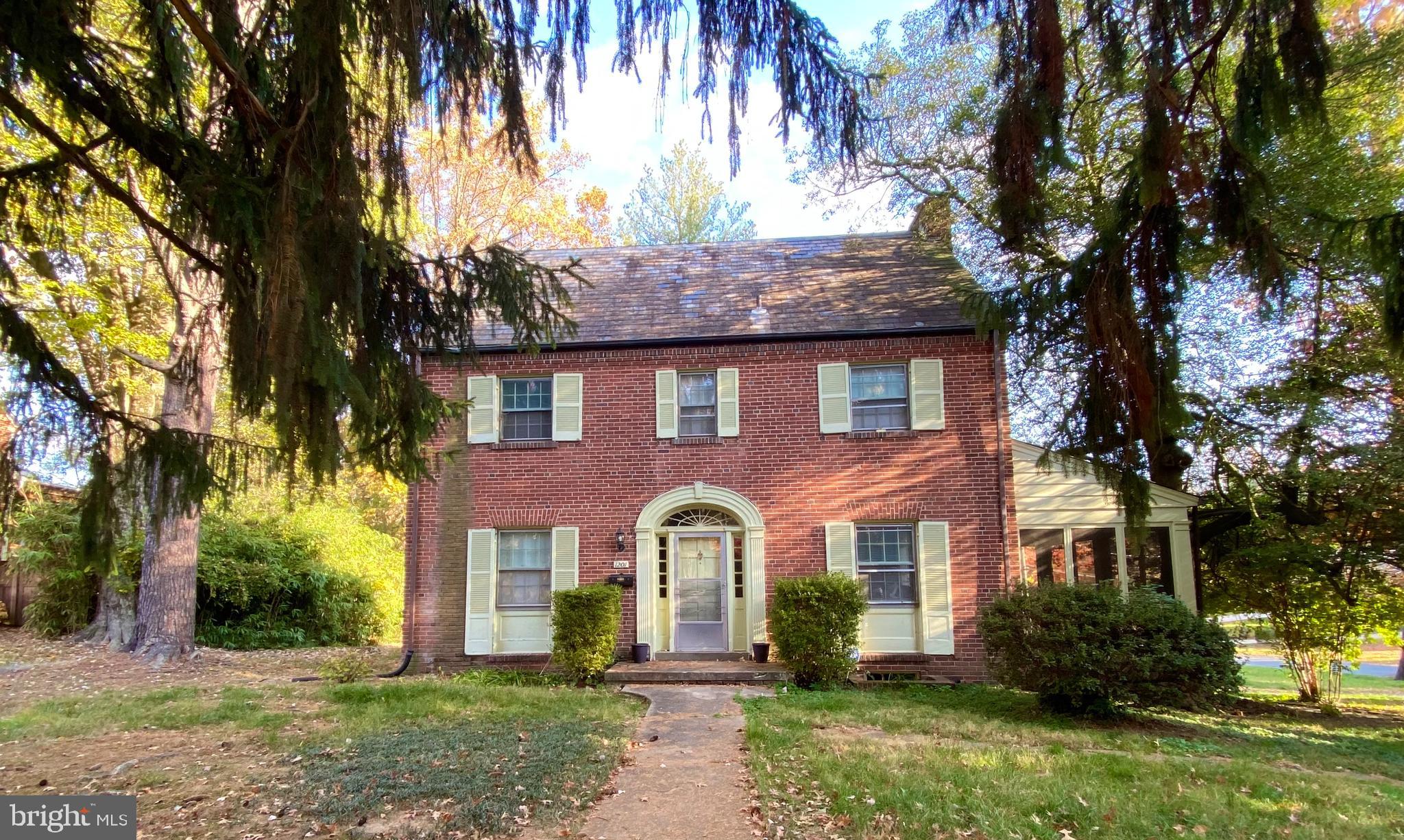 1201 Noyes Drive Silver Spring, MD 20910 - Photo 3 of 35 front view of a house with a yard