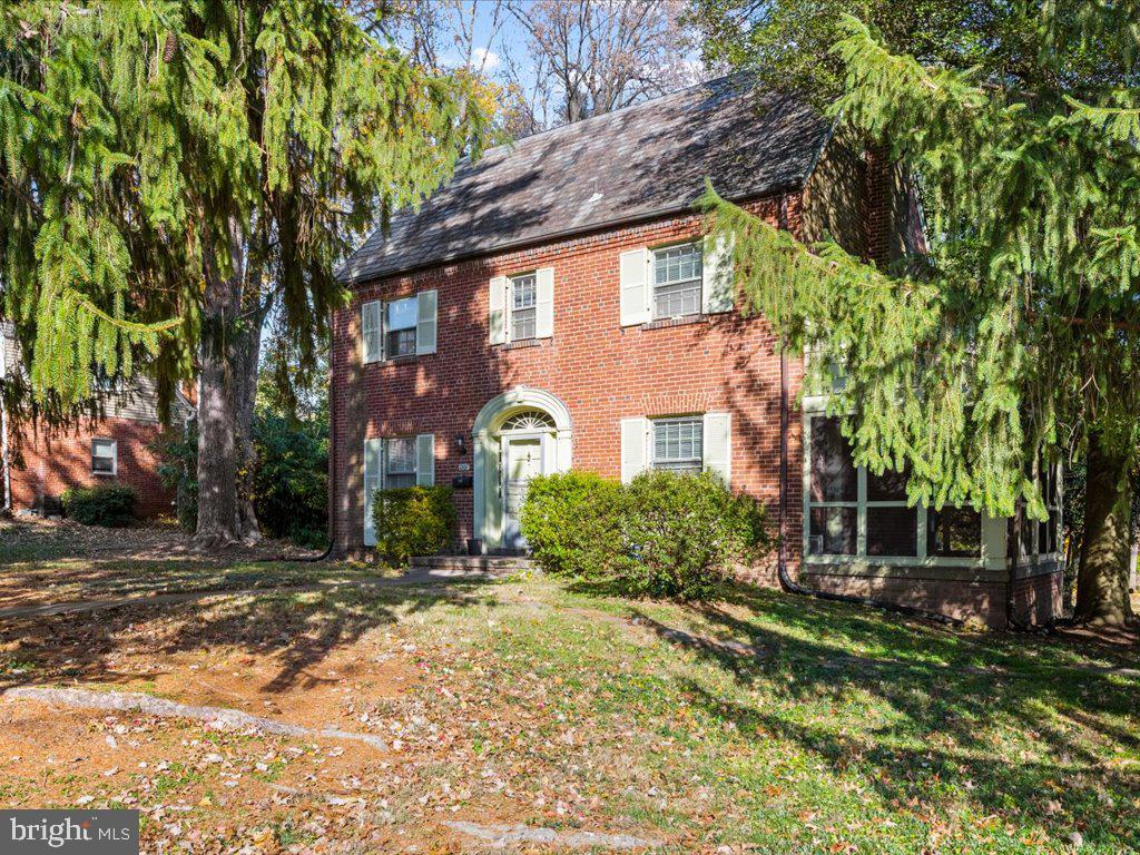 1201 Noyes Drive Silver Spring, MD 20910 - Photo 4 of 35 a front view of a house with a yard