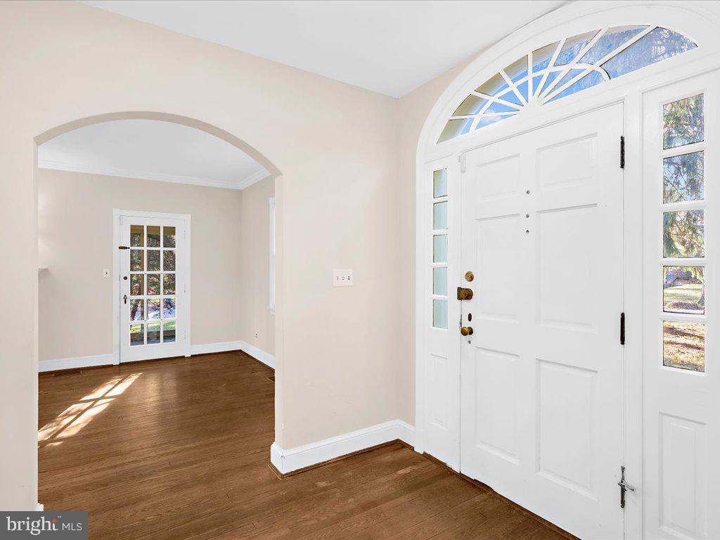 1201 Noyes Drive Silver Spring, MD 20910 - Photo 5 of 35 an empty room with wooden floor closet and windows