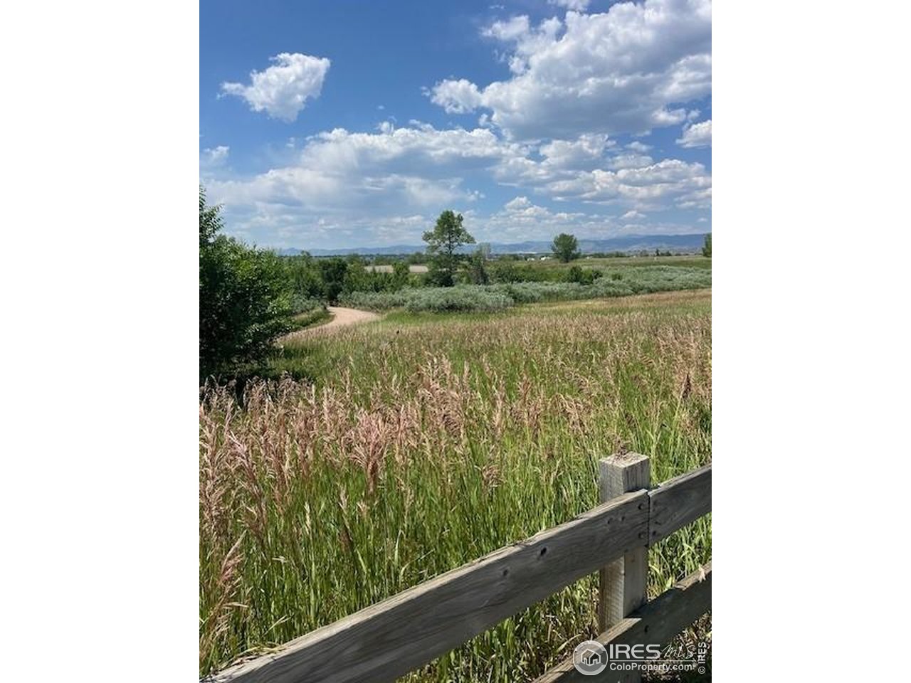 10947 West 100th Drive Broomfield, CO 80021 - Photo 38 of 38 a view of a lake from a balcony