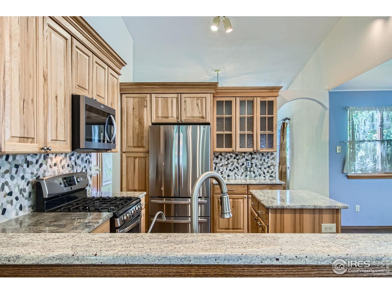 10947 West 100th Drive Broomfield, CO 80021 - Photo 7 of 38 a black and white photo of a living room