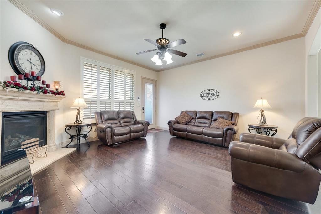 5056 Empire Way Irving, TX 75038 - Photo 11 of 40 a living room with furniture and a fireplace