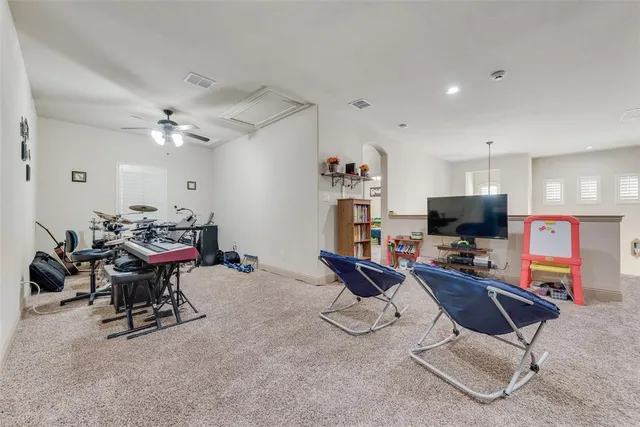 a view of a workspace with furniture