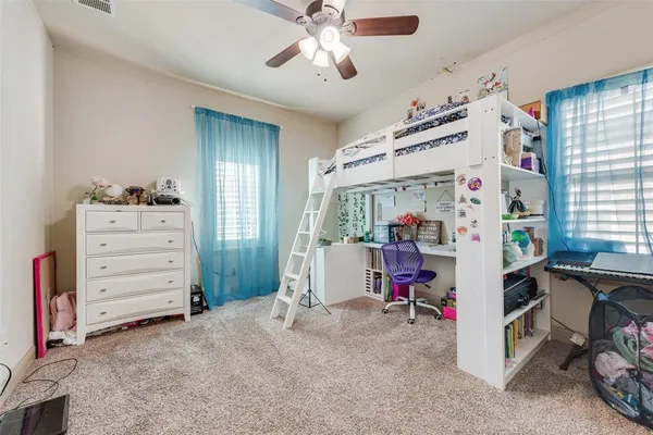 a view of room with stairs and a window